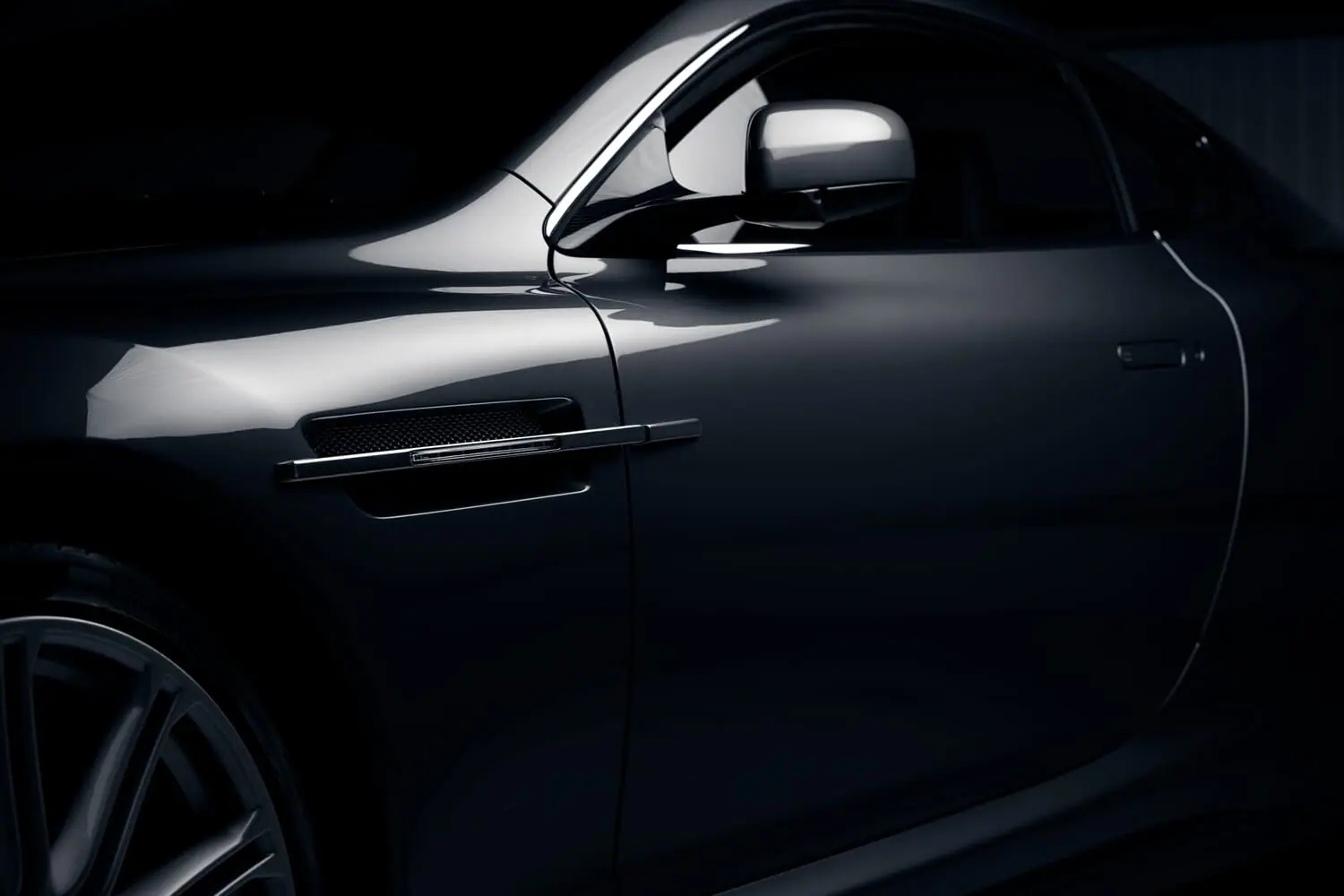 Aston Martin side profile, photographed in the dark