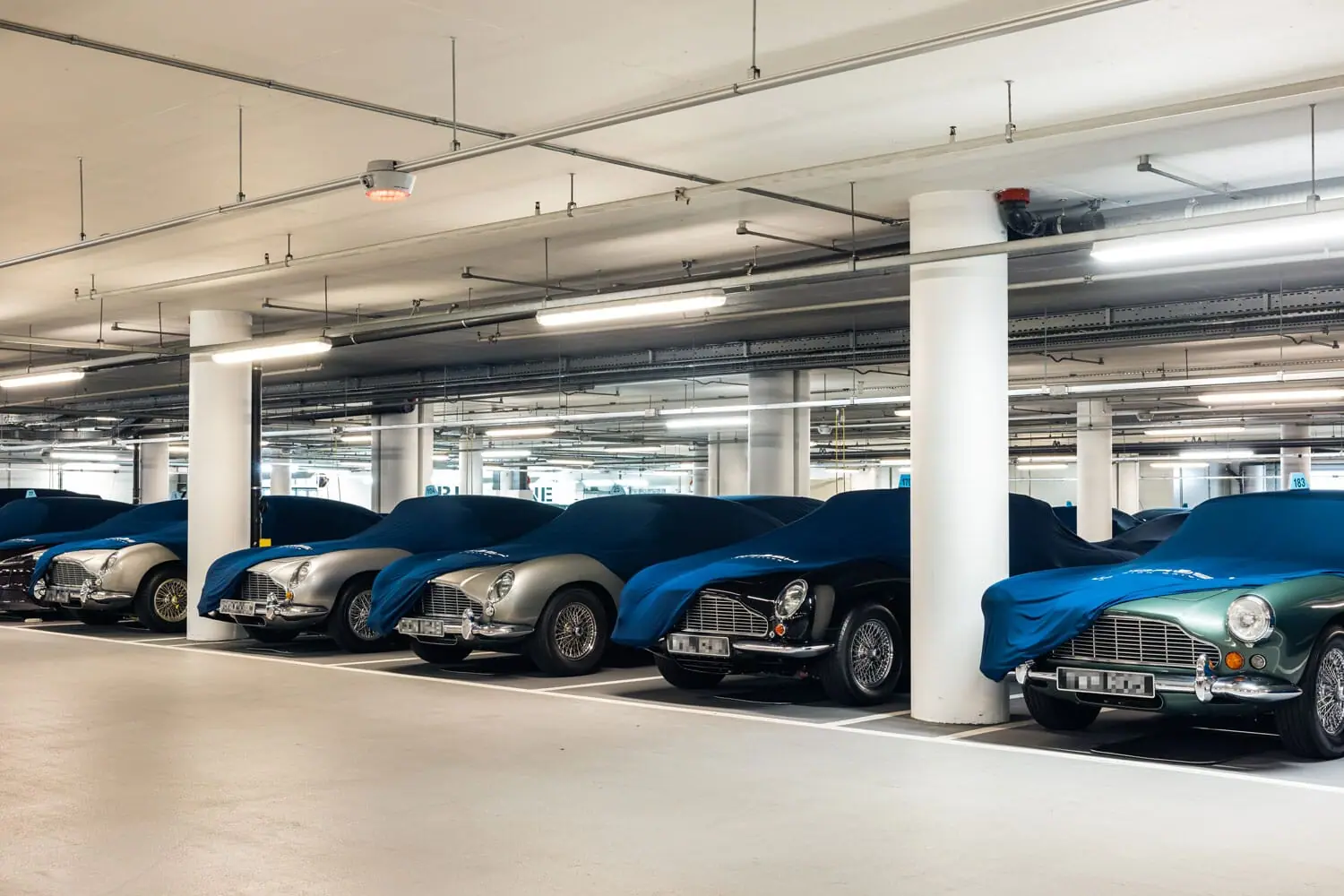 Classic cars waiting in their bays in London