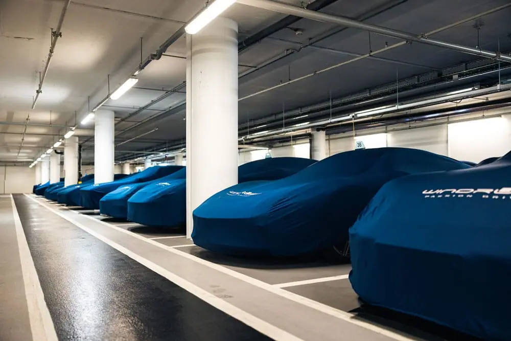 Electric cars under covers on charge
